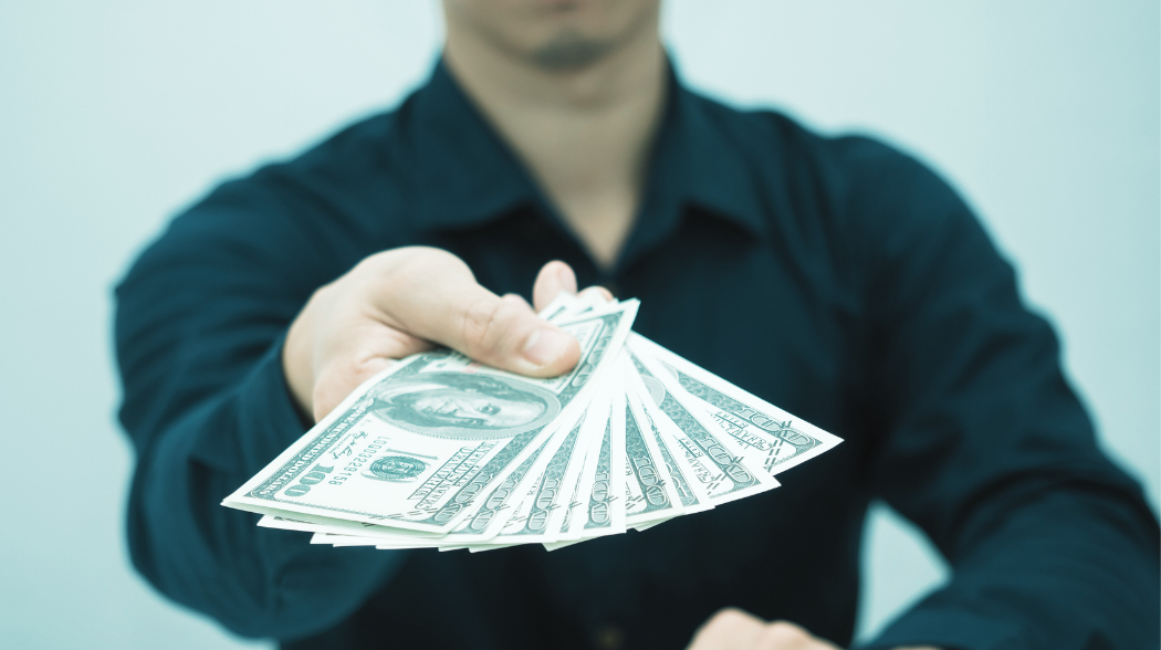 Agent approving an inheritance cash advance and sharing the finances